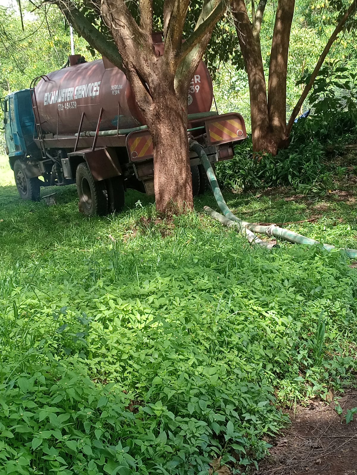 Omidrop Africa exhauster truck siphoning septic tank Kenya
