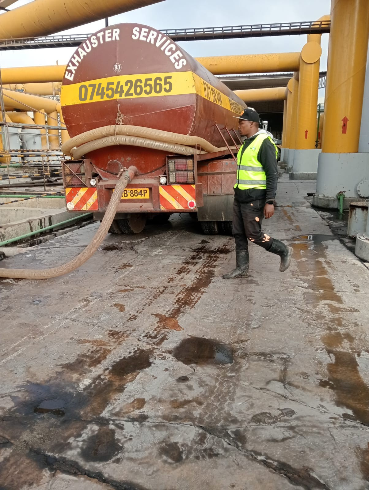 OmiDrop Africa high-capacity exhauster truck providing commercial septic tank emptying across Nairobi, Kenya — industrial vacuum siphoning fleet for hotels, restaurants, and factories