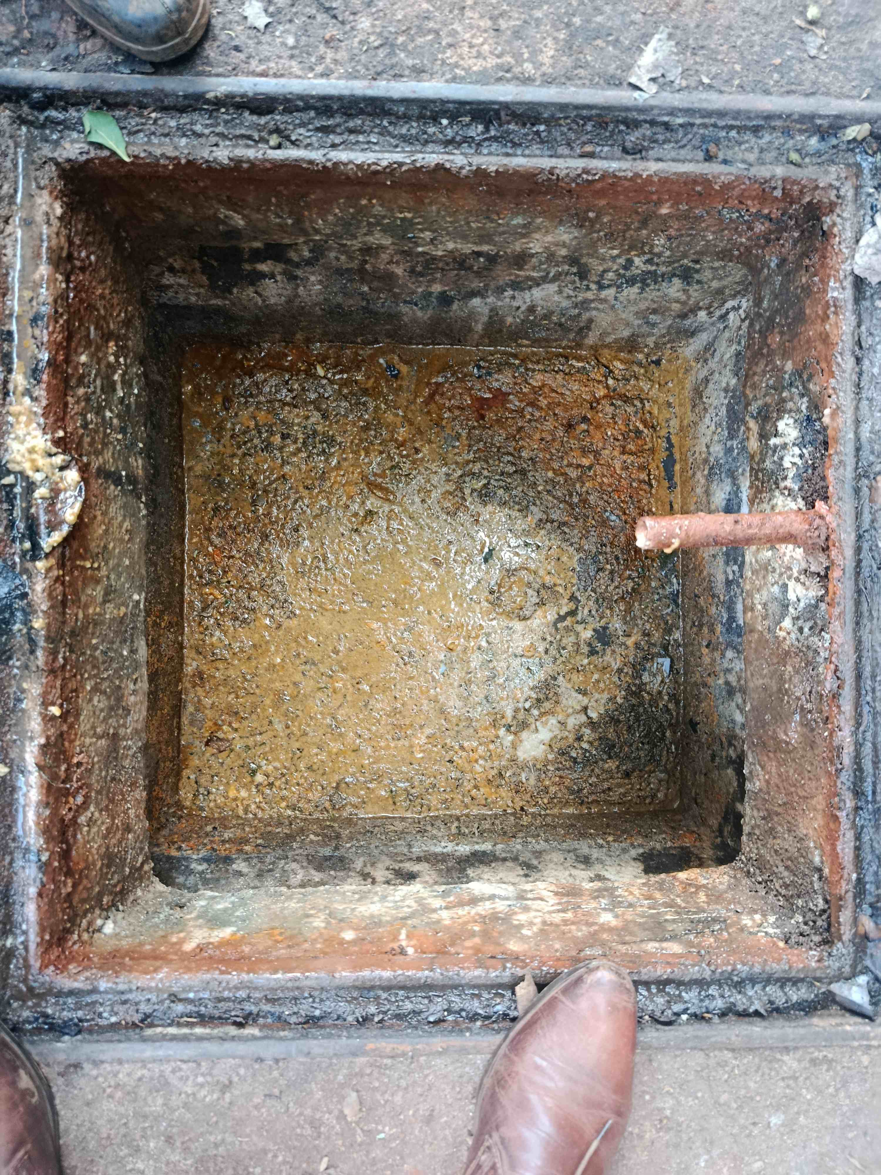 Professional grease cleaning services Kenya — Omidrop Africa team cleaning a commercial kitchen exhaust system